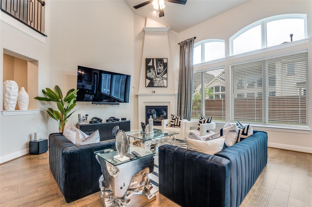 2417 Shane Drive Midlothian, TX 76065 - Photo 5 of 40 a living room with fireplace furniture and a large window
