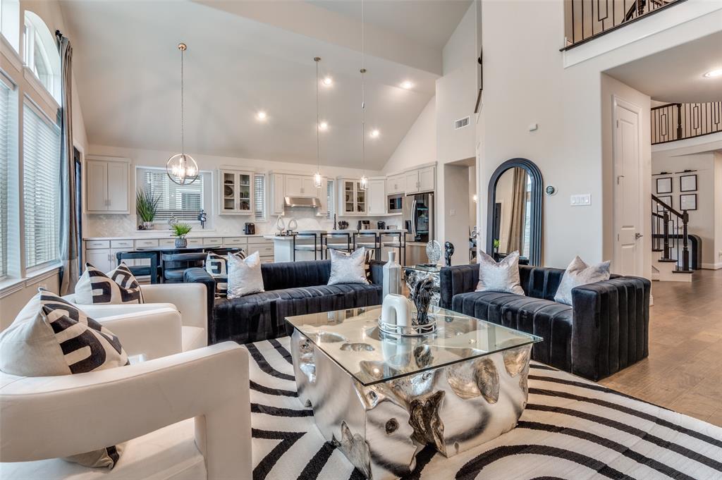 2417 Shane Drive Midlothian, TX 76065 - Photo 7 of 40 a living room with fireplace furniture and a view of kitchen