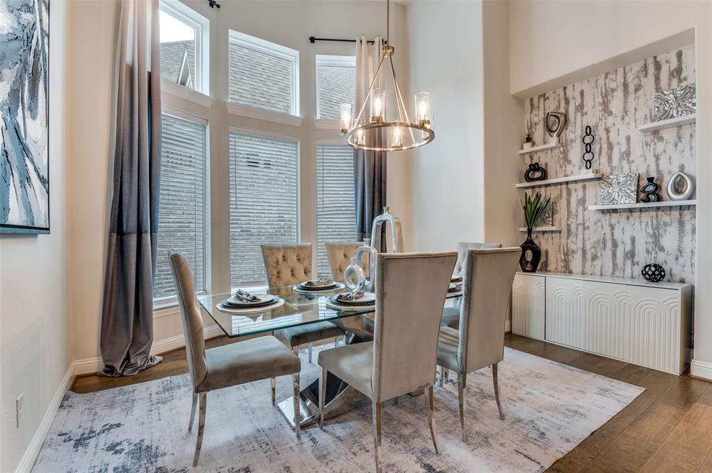2417 Shane Drive Midlothian, TX 76065 - Photo 8 of 40 a view of a dining room with furniture and a chandelier