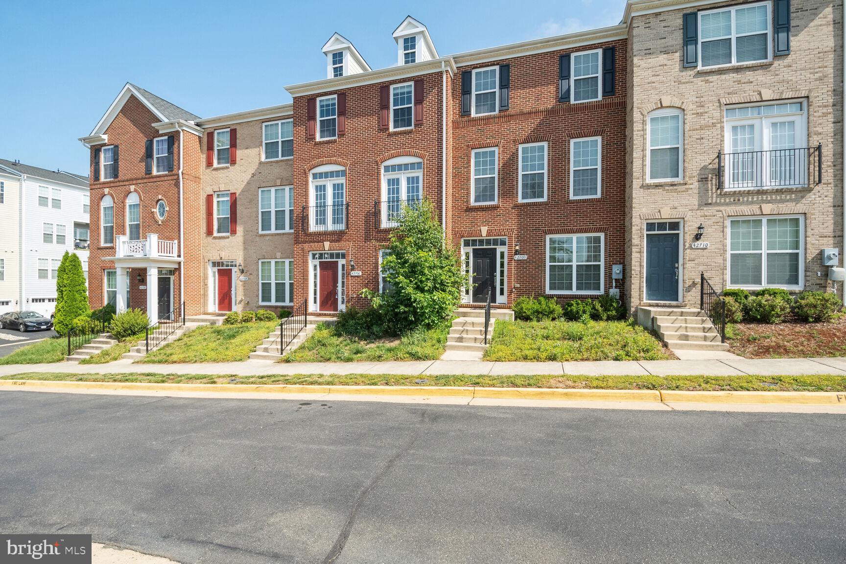 a front view of a multi story residential apartment building