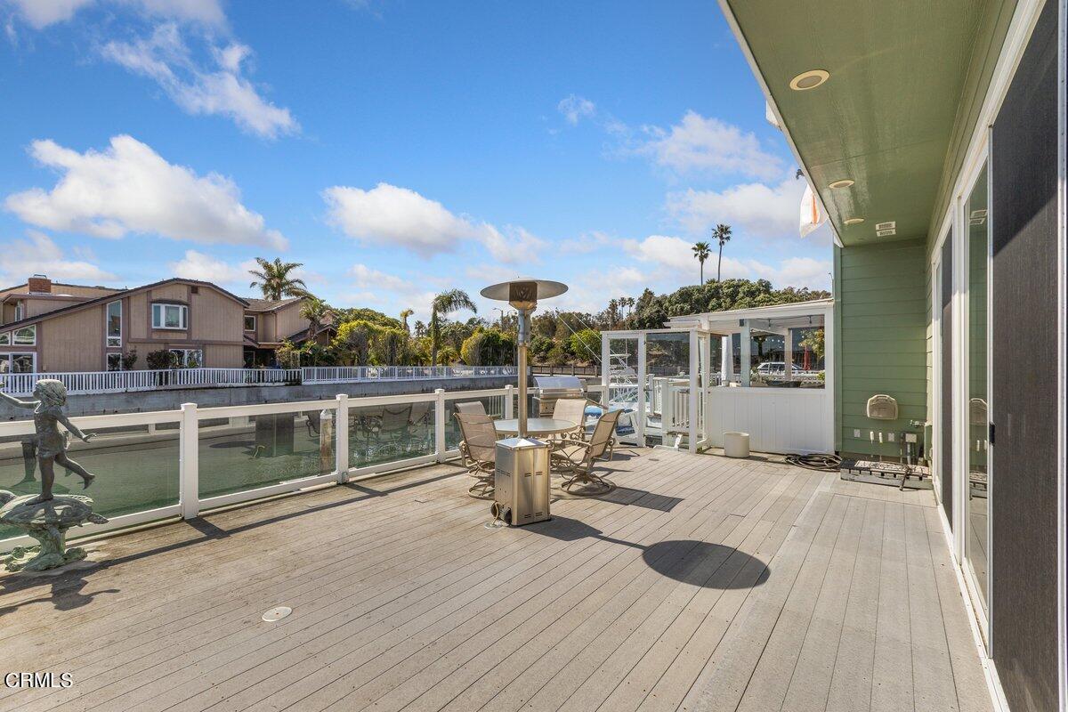 4530 Lyme Bay Oxnard, CA 93035 - Photo 13 of 46 a view of balcony with two chairs and wooden floor