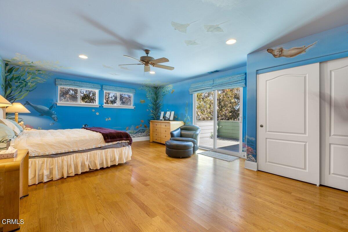 4530 Lyme Bay Oxnard, CA 93035 - Photo 16 of 46 a bed room with furniture and wooden floor