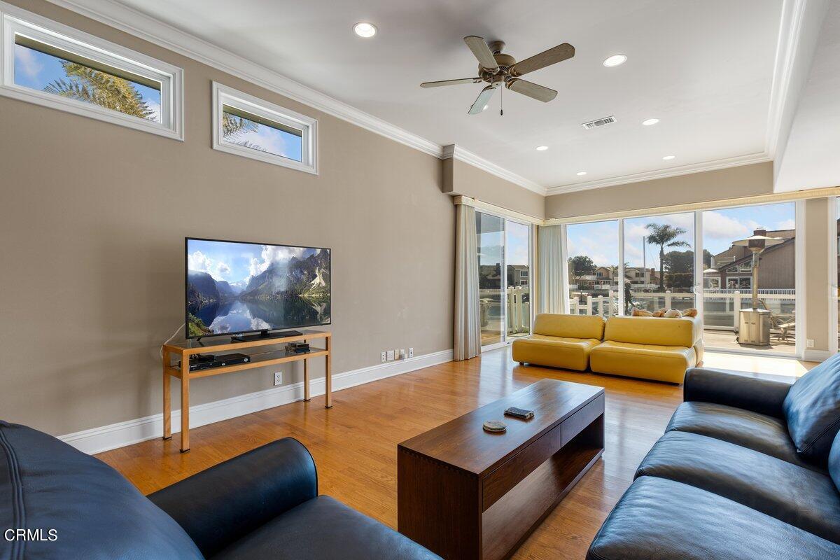 4530 Lyme Bay Oxnard, CA 93035 - Photo 33 of 46 a living room with furniture and a flat screen tv