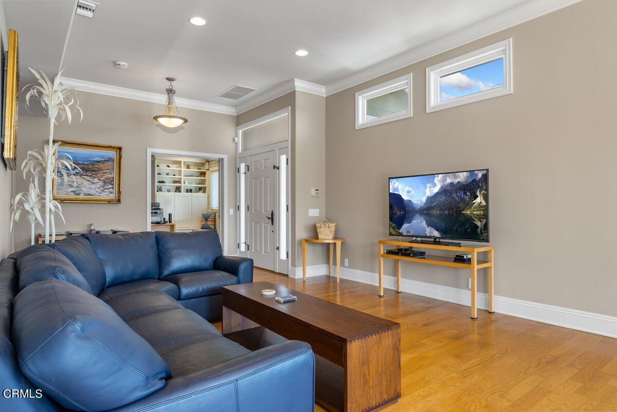4530 Lyme Bay Oxnard, CA 93035 - Photo 34 of 46 a living room with furniture and a flat screen tv