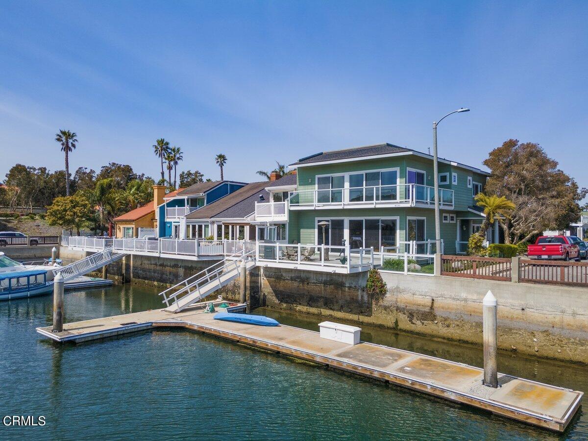 4530 Lyme Bay Oxnard, CA 93035 - Photo 39 of 46 a front view of a house with swimming pool having outdoor seating
