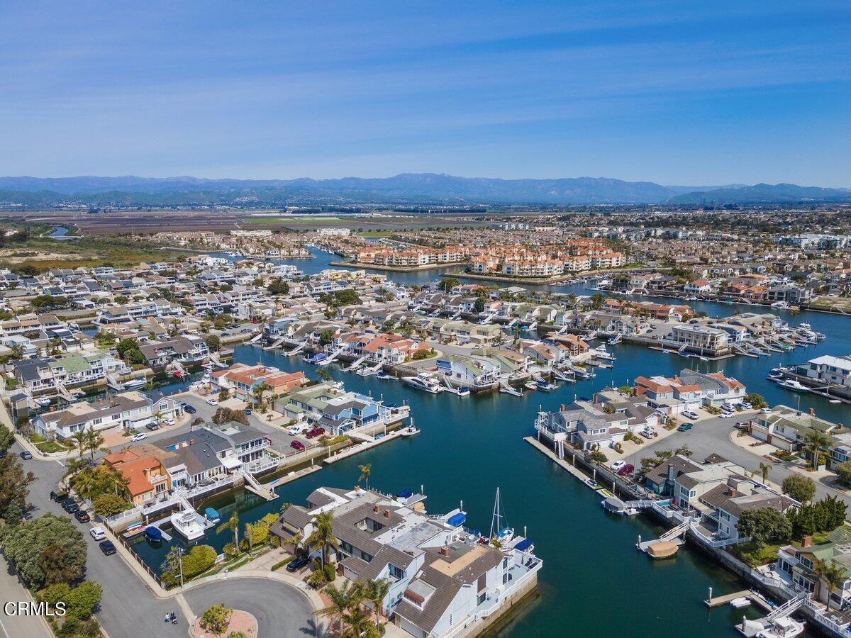 4530 Lyme Bay Oxnard, CA 93035 - Photo 44 of 46 an aerial view of a city with ocean view in back