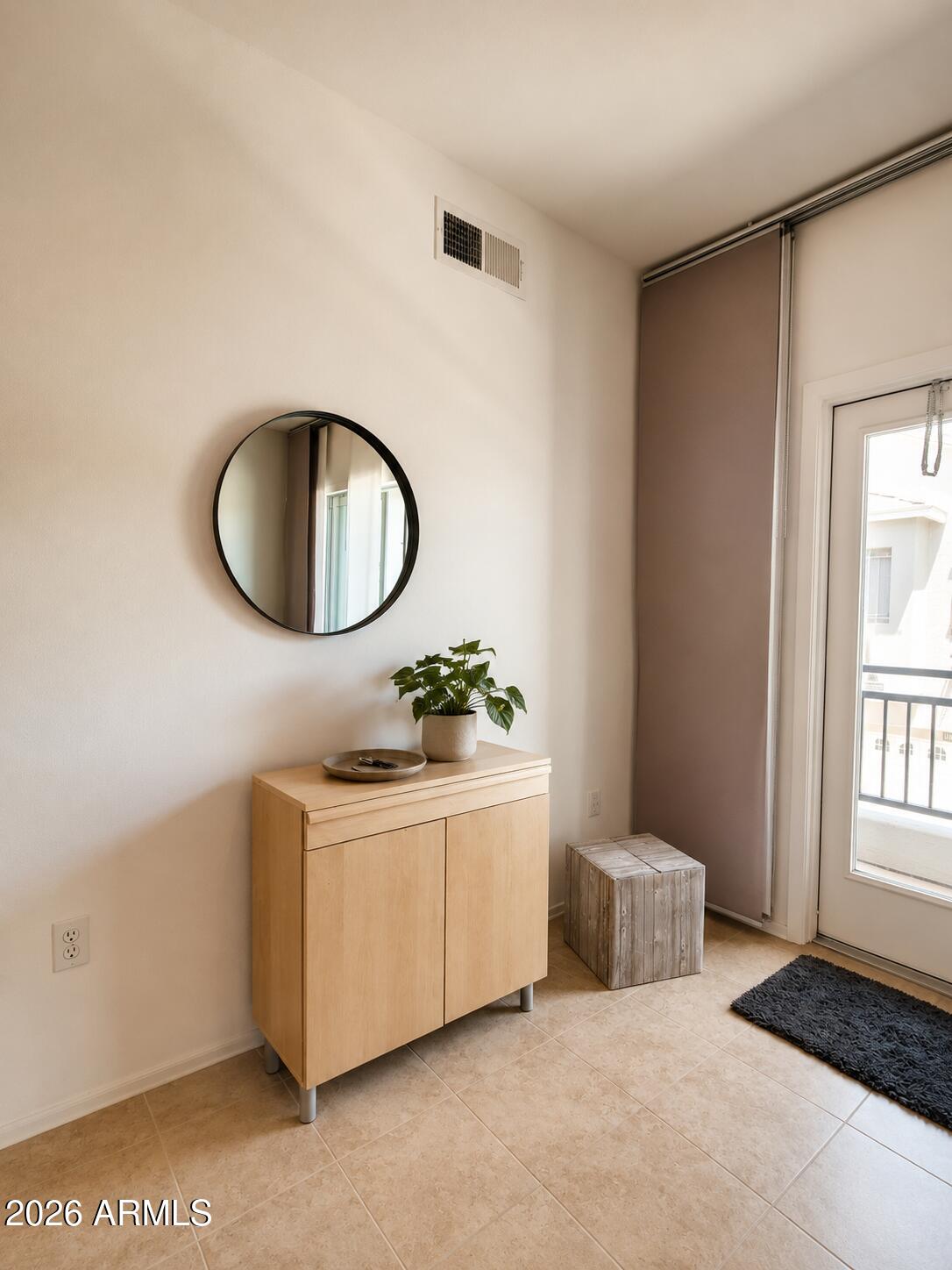 2150 West Alameda Road, Unit 1020 Phoenix, AZ 85085 - Photo 16 of 35 a bathroom with a double vanity sink and a mirror