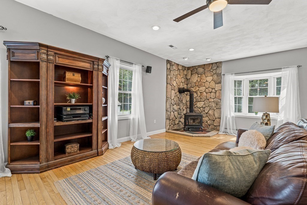 7 Cynthia Road Billerica, MA 01821 - Photo 16 of 41 a living room with furniture and wooden floor