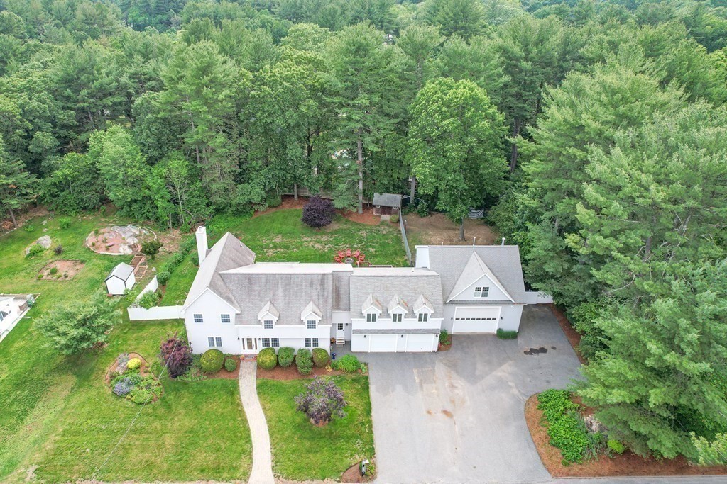7 Cynthia Road Billerica, MA 01821 - Photo 3 of 41 an aerial view of residential house with outdoor space and trees all around