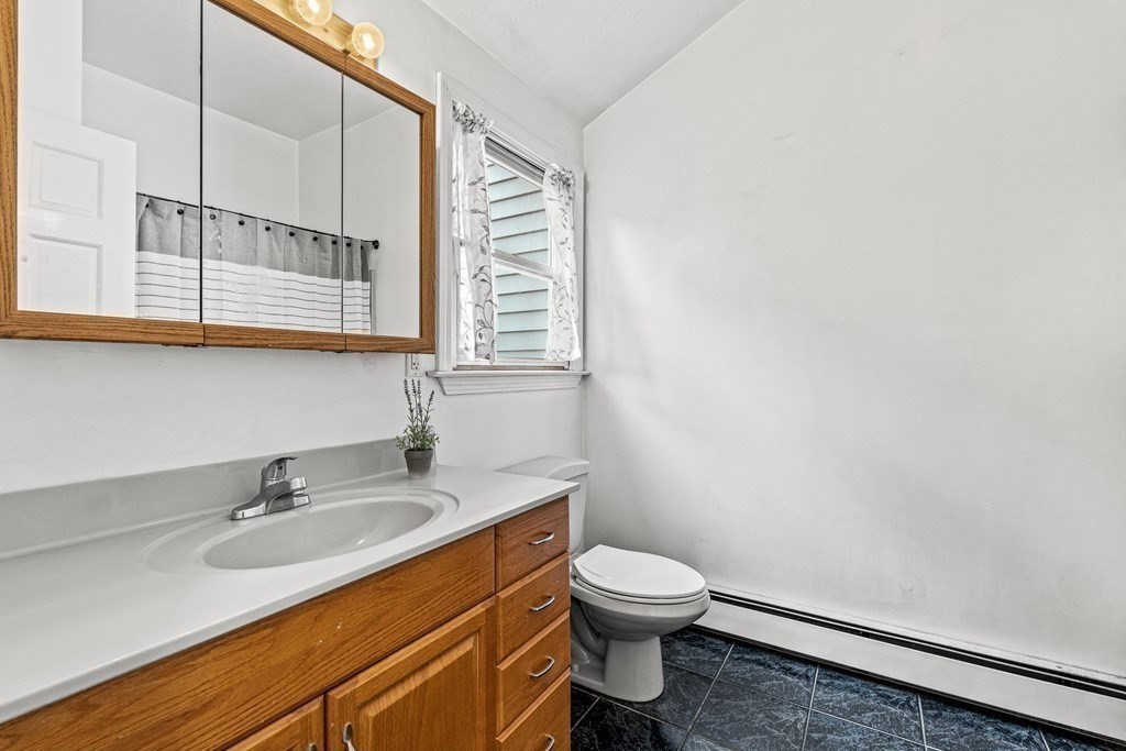 7 Cynthia Road Billerica, MA 01821 - Photo 34 of 41 a bathroom with a sink and a toilet