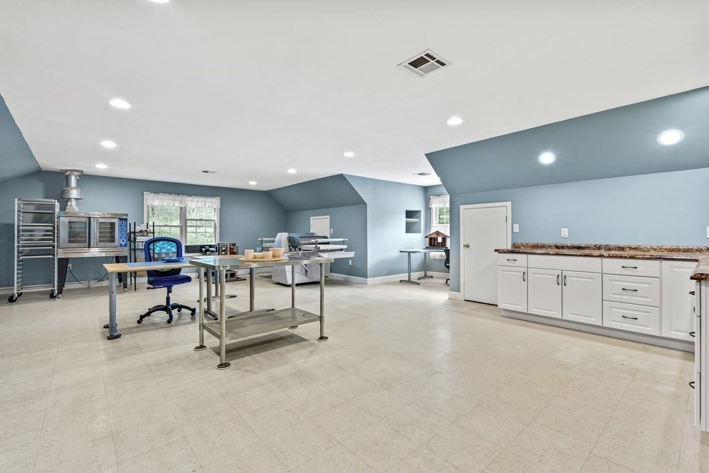 7 Cynthia Road Billerica, MA 01821 - Photo 35 of 41 a living room with furniture and kitchen view
