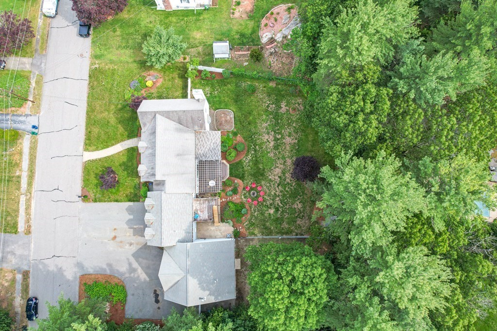 7 Cynthia Road Billerica, MA 01821 - Photo 4 of 41 an aerial view of a house with a yard and garden