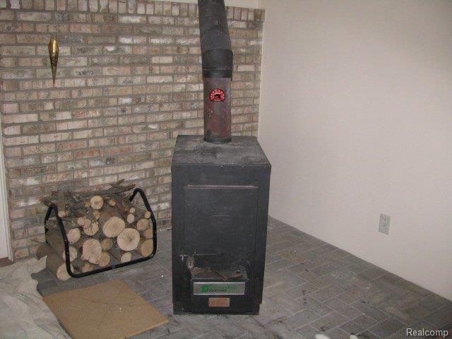 62157 Wolcott Road Ray, MI 48096 - Photo 13 of 25 Wood Burning Stove in Finished B