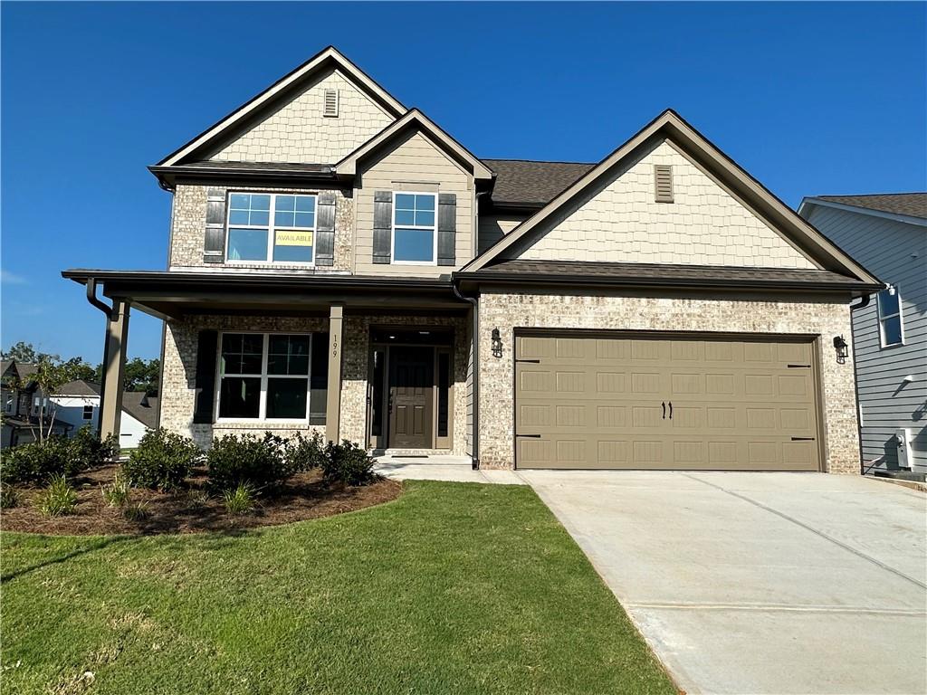 199 Sunshower Ridge Canton, GA 30114 - Photo 1 of 1 a front view of a house with yard