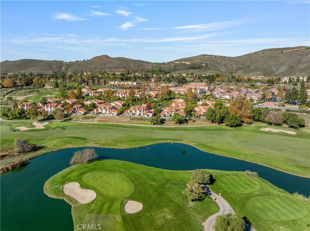 406 Country Club Drive Simi Valley, CA 93065 - Photo 14 of 56 an aerial view of a golf course with a swimming pool