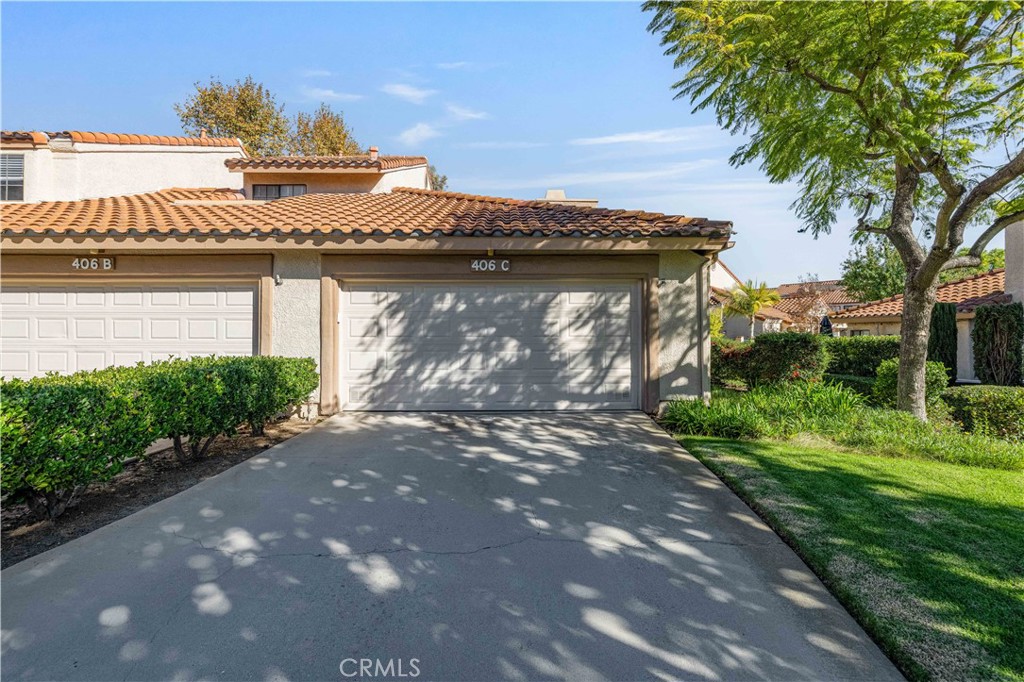 406 Country Club Drive Simi Valley, CA 93065 - Photo 16 of 56 a view of a street with a building in the background