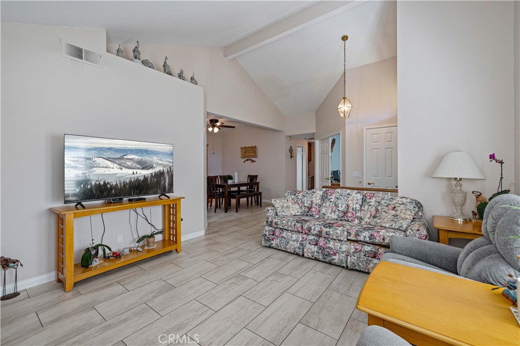 406 Country Club Drive Simi Valley, CA 93065 - Photo 22 of 56 a living room with furniture and a flat screen tv