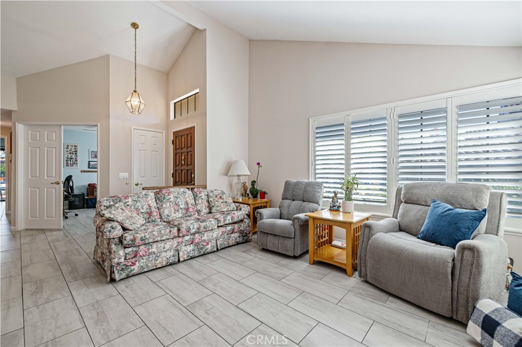 406 Country Club Drive Simi Valley, CA 93065 - Photo 23 of 56 a living room with furniture and a large window