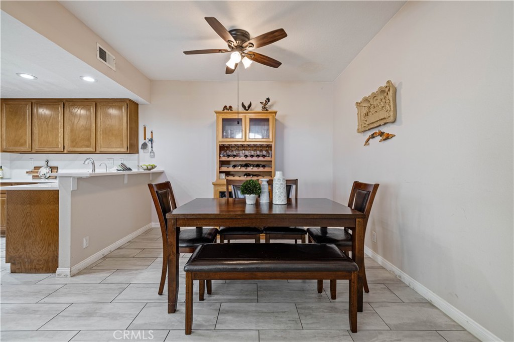 406 Country Club Drive Simi Valley, CA 93065 - Photo 24 of 56 a view of a dining room with furniture