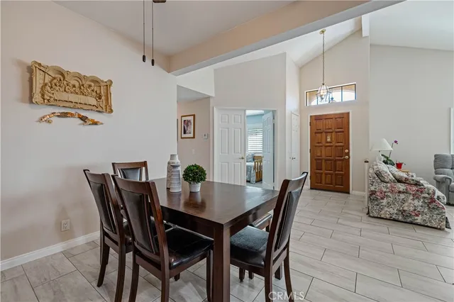 a kitchen with a sink appliances and cabinets