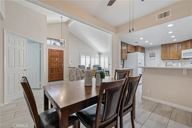 a kitchen that has a sink and a stove in it