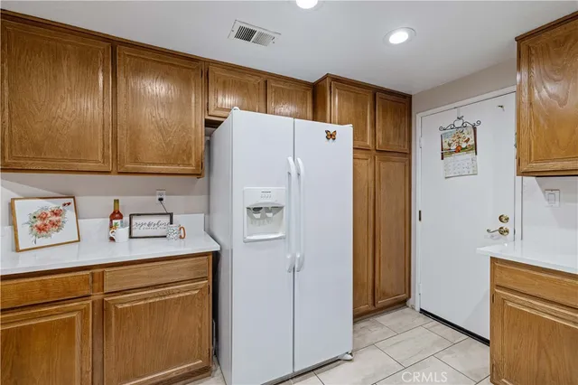 a kitchen with a sink stove and microwave