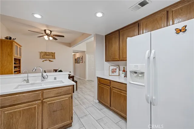 a bedroom with furniture and a chandelier