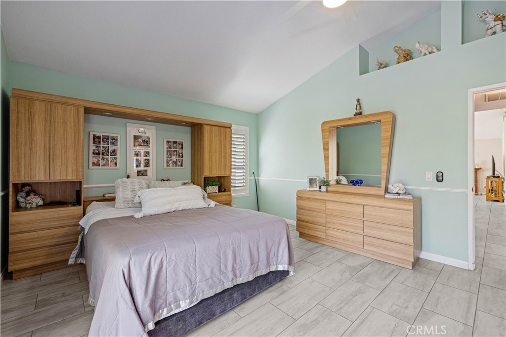 406 Country Club Drive Simi Valley, CA 93065 - Photo 41 of 56 a bedroom with a bed and a dresser