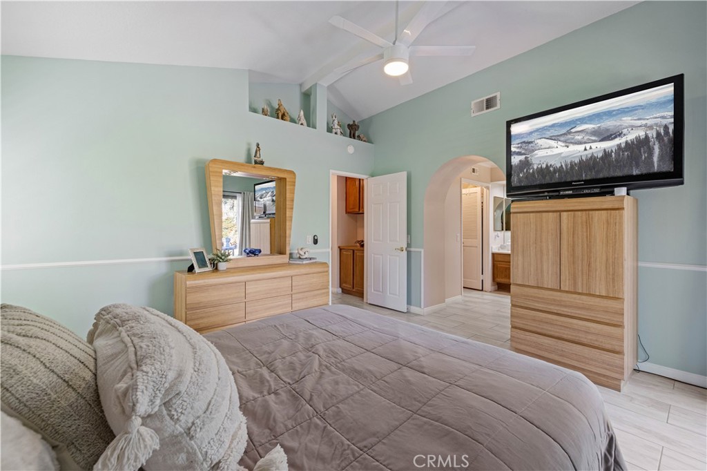 406 Country Club Drive Simi Valley, CA 93065 - Photo 42 of 56 a bedroom with a bed and a flat screen tv