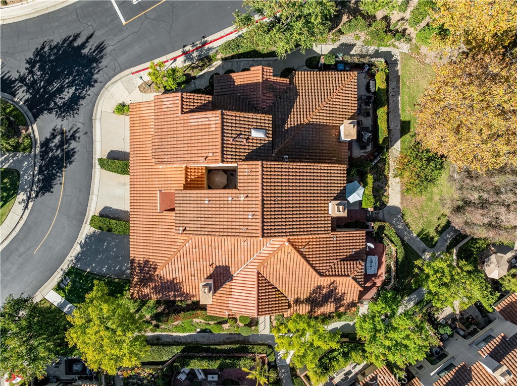 406 Country Club Drive Simi Valley, CA 93065 - Photo 5 of 56 an aerial view of a house with a yard and potted plants
