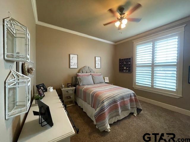 19330 Brittni Rae Court Lindale, TX 75771 - Photo 11 of 14 a bed room with a bed and a chandelier