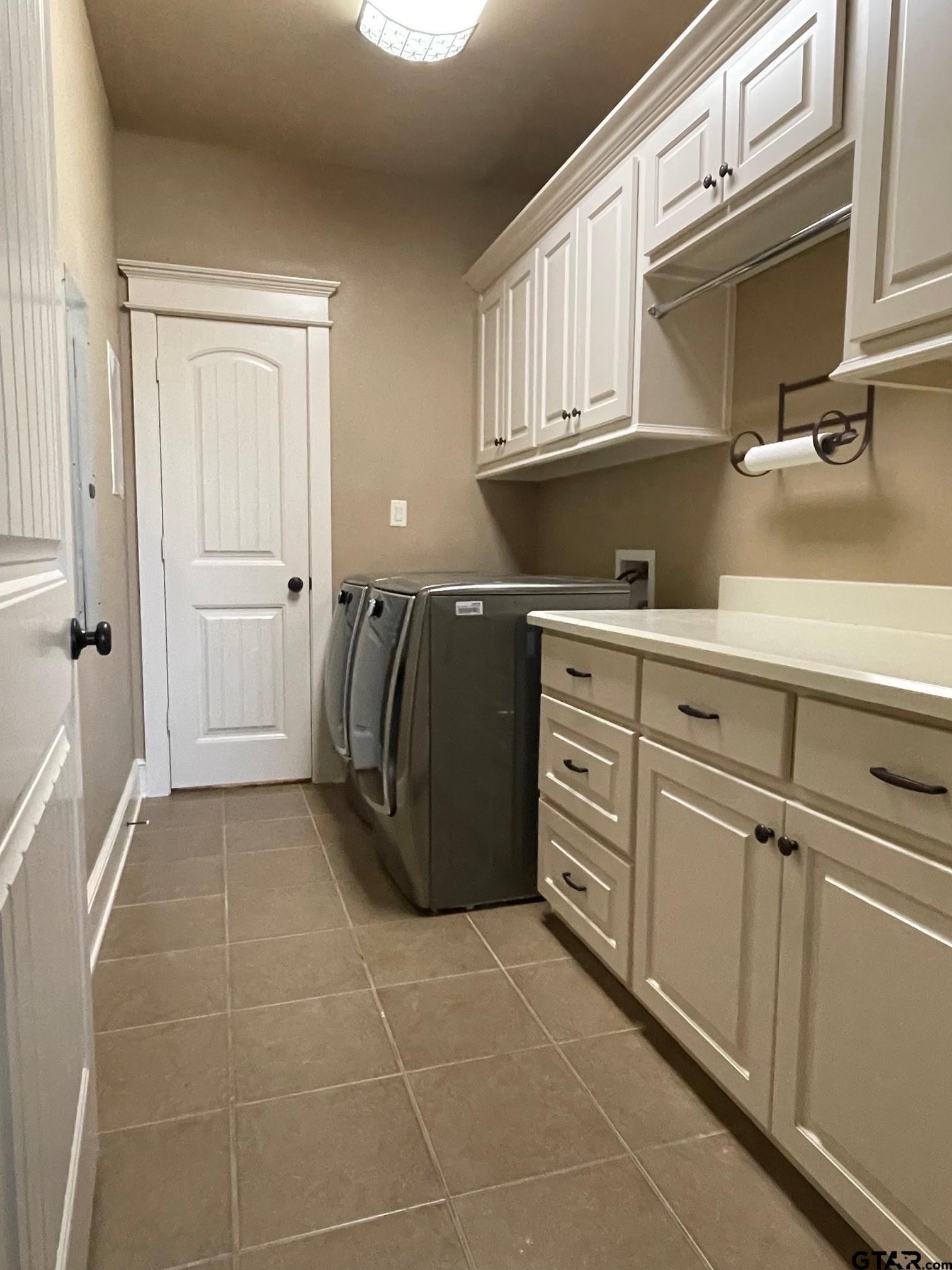 19330 Brittni Rae Court Lindale, TX 75771 - Photo 13 of 14 a kitchen with a cabinets and appliances