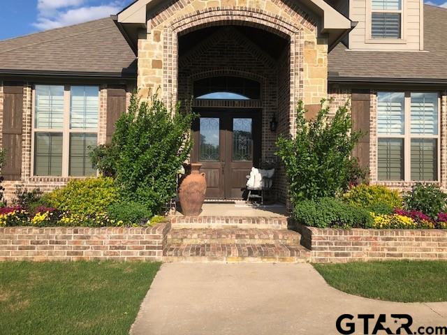 19330 Brittni Rae Court Lindale, TX 75771 - Photo 4 of 14 a front view of a house with a yard