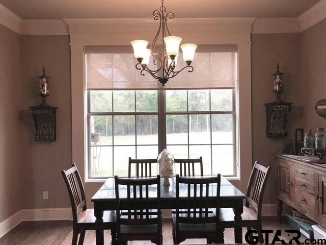 19330 Brittni Rae Court Lindale, TX 75771 - Photo 9 of 14 a view of a dining room with furniture window and outside view