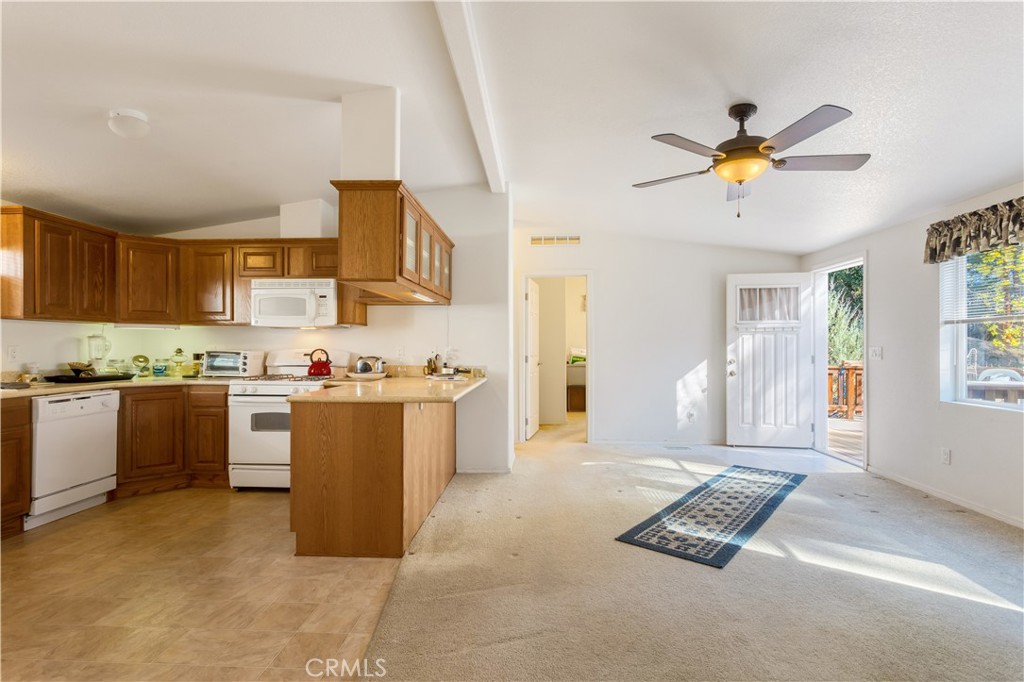 23700 Clement Way Idyllwild, CA 92549 - Photo 18 of 32 a kitchen with cabinets and window
