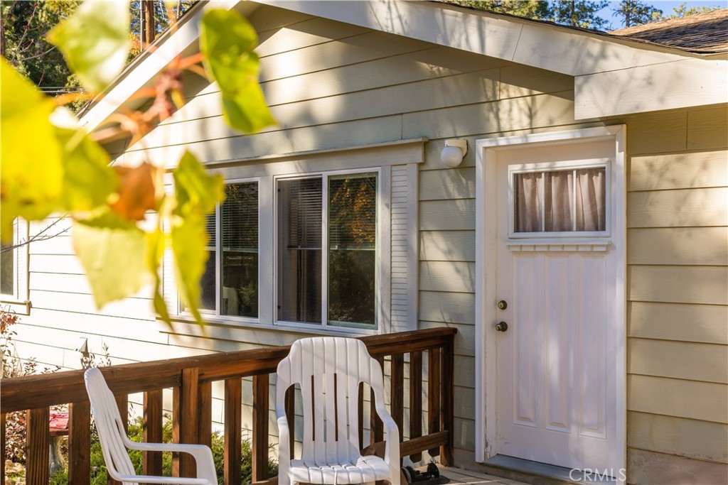 23700 Clement Way Idyllwild, CA 92549 - Photo 3 of 32 a view of a brick house with a large windows