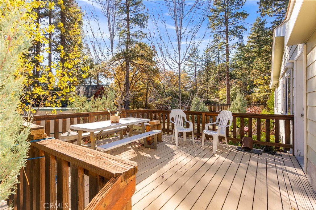 23700 Clement Way Idyllwild, CA 92549 - Photo 4 of 32 a view of a balcony with two chairs and a table