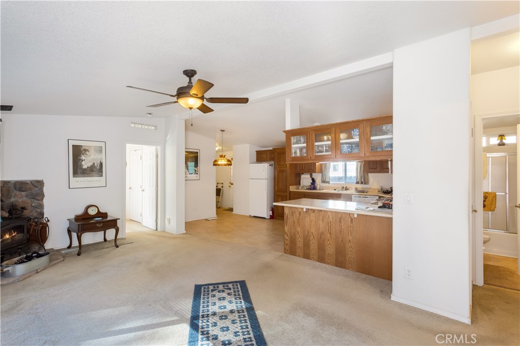 23700 Clement Way Idyllwild, CA 92549 - Photo 6 of 32 a living room with granite countertop furniture and fireplace
