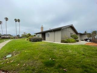 Undisclosed Address Aptos, CA 95003 - Photo 4 of 10 a house view with a garden space