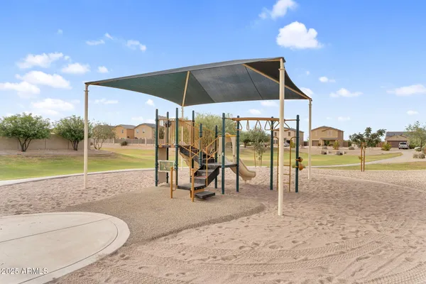 a view of an ocean with a swimming pool