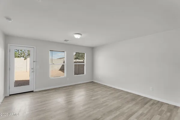 an empty room with windows