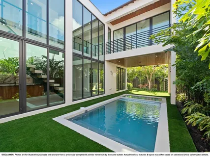 a view of a room with wooden floor and windows