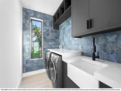 a view of an empty room with wooden floor and windows