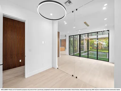 a view of empty room with front door