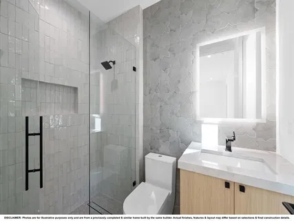 a large kitchen with a sink and cabinets