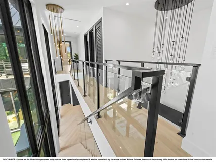 a bathroom with a toilet a sink a mirror a vanity and shower