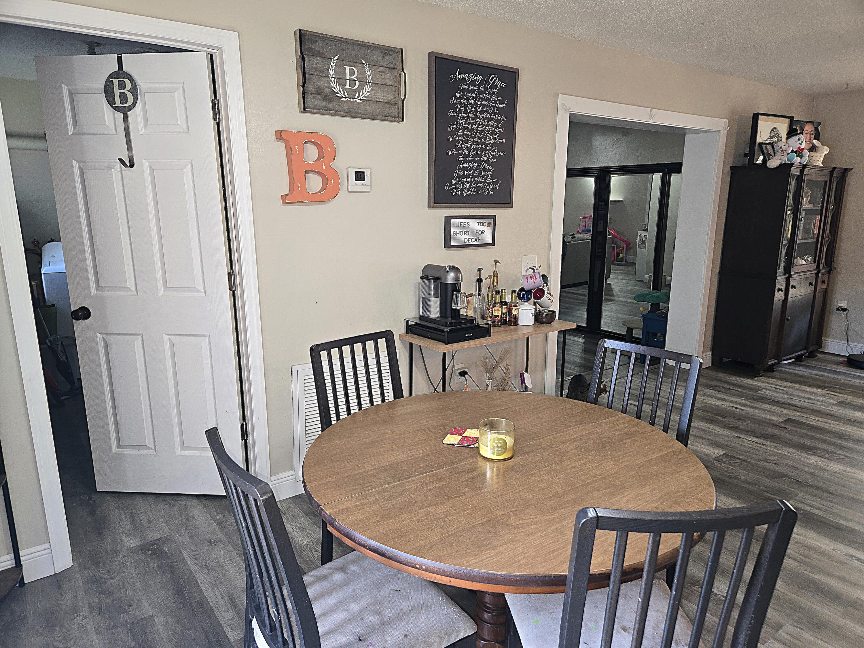 211 Northeast 3rd Terrace Williston, FL 32696 - Photo 11 of 46 a view of a dining room with furniture