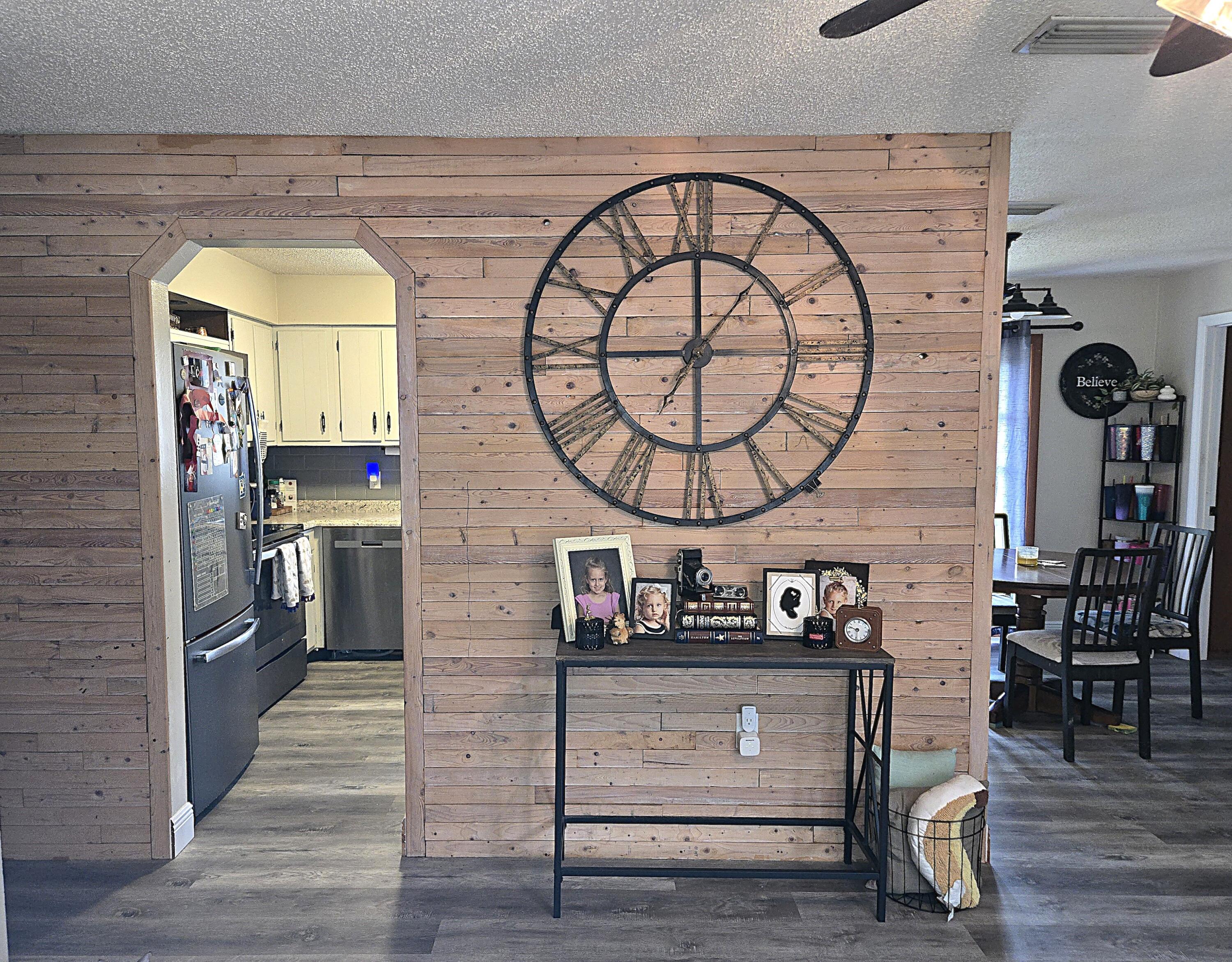 211 Northeast 3rd Terrace Williston, FL 32696 - Photo 2 of 46 a view of room with furniture and wooden floor