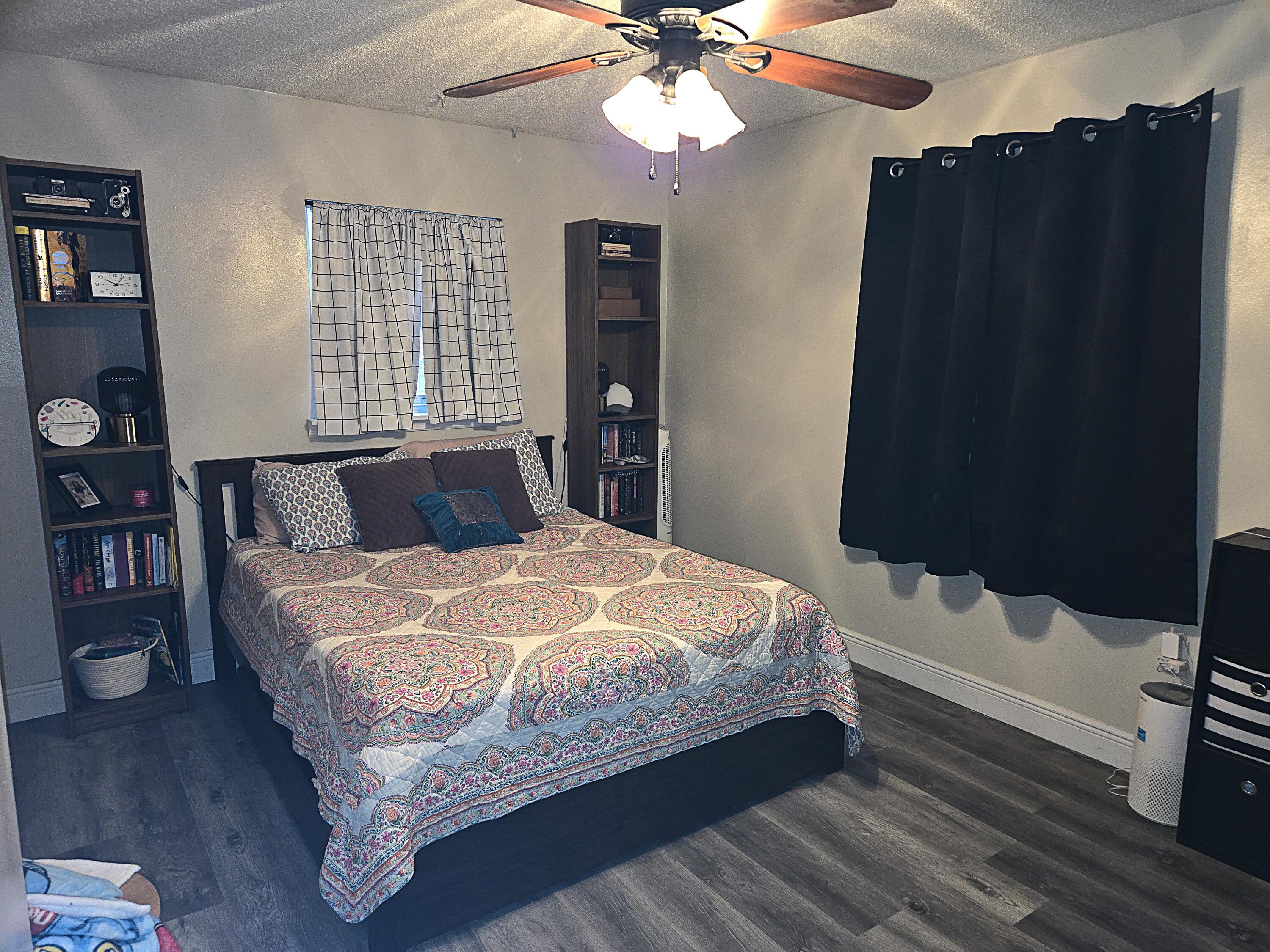 211 Northeast 3rd Terrace Williston, FL 32696 - Photo 26 of 46 a bedroom with bed and window