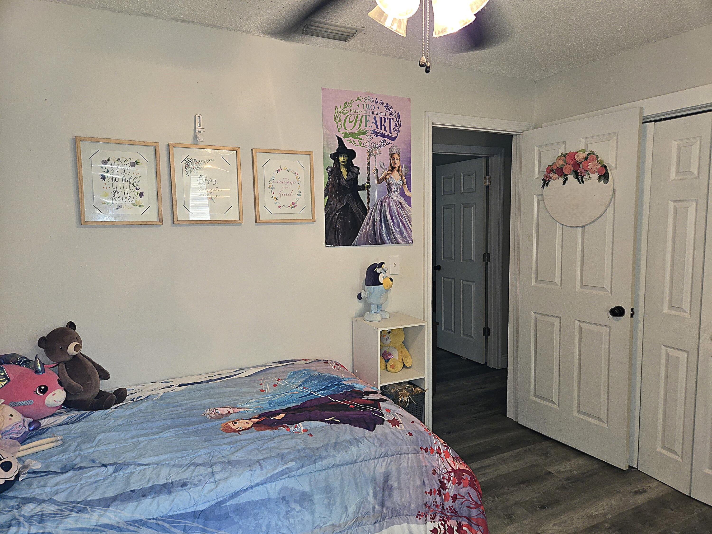 211 Northeast 3rd Terrace Williston, FL 32696 - Photo 35 of 46 a bedroom with a bed and a view of room